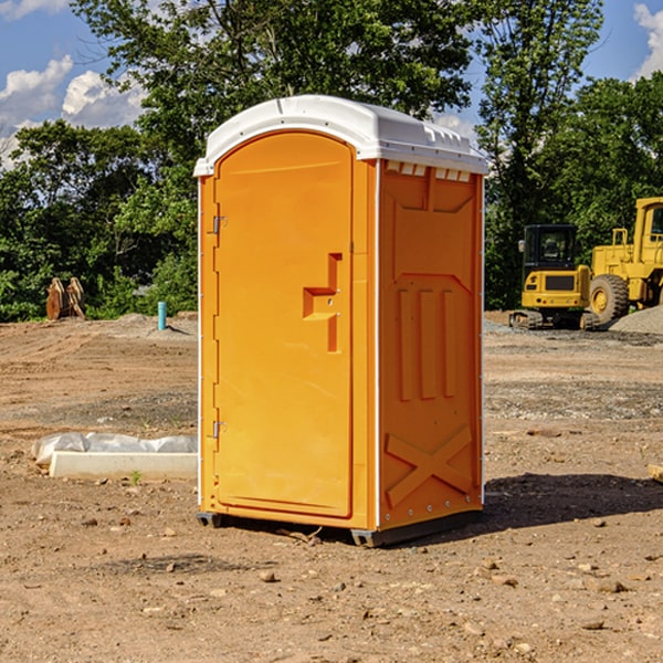 how often are the portable restrooms cleaned and serviced during a rental period in Burt Lake MI